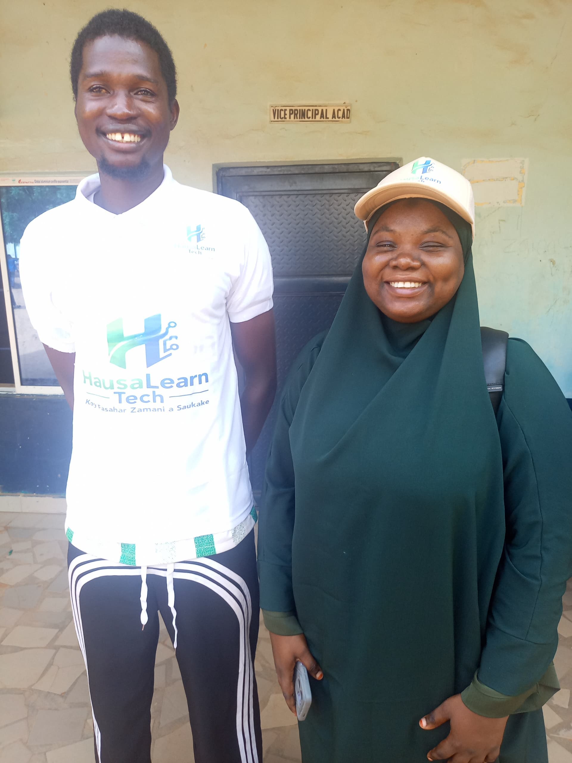 HausaLearn Tech team members in branded apparel during a school outreach visit